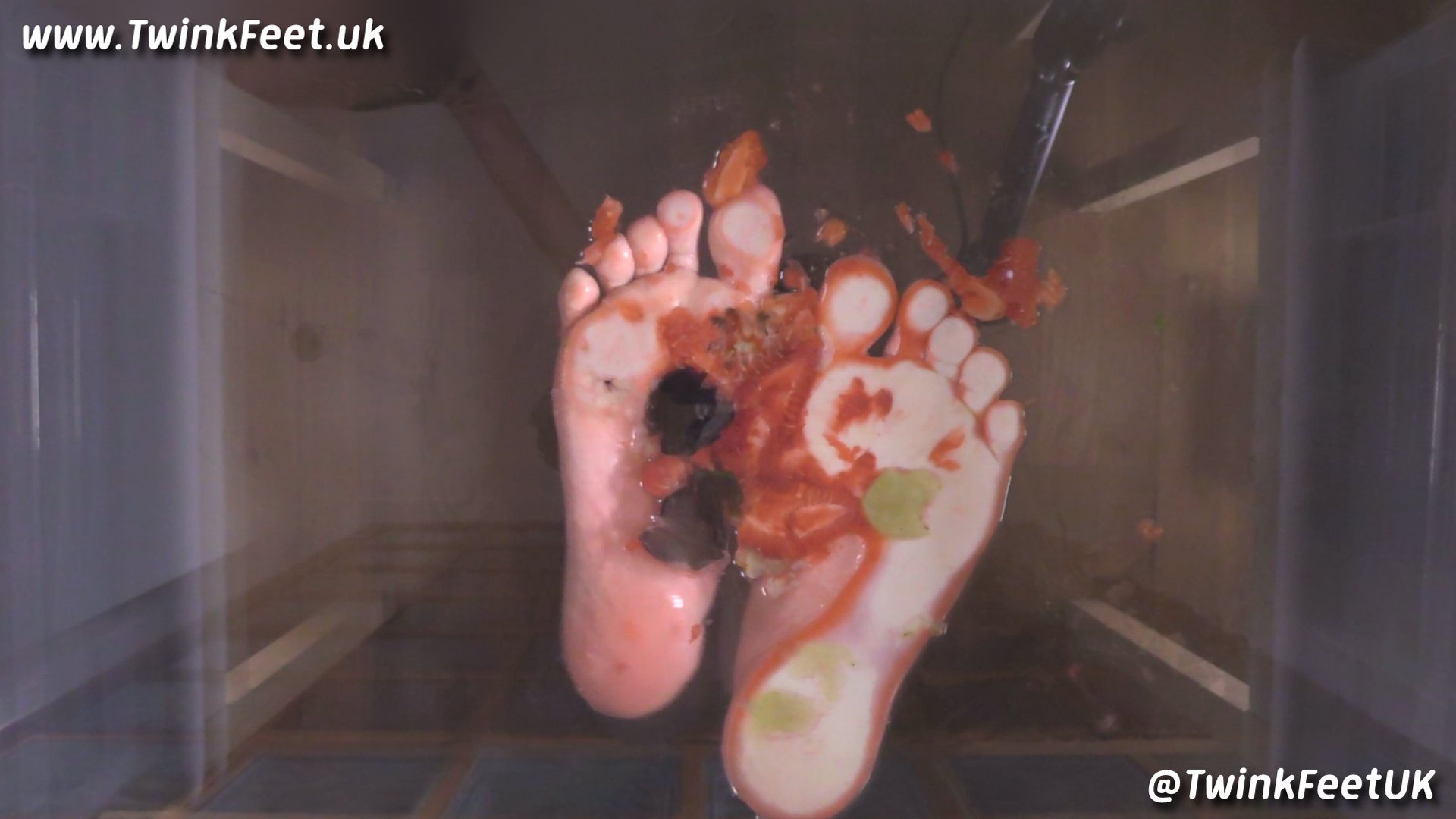 @BGNFeet crushing fruit and cakes on a glass panel