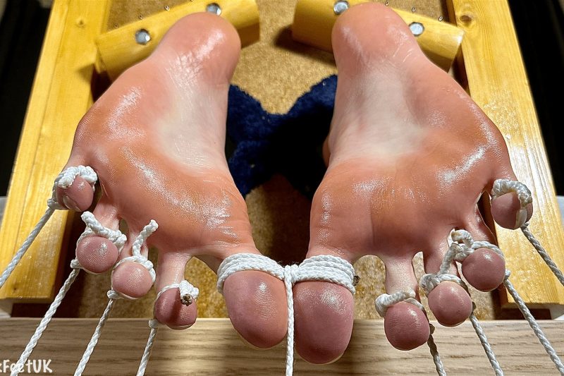 Photos of @DomJTwink with his toes tied down in my stocks