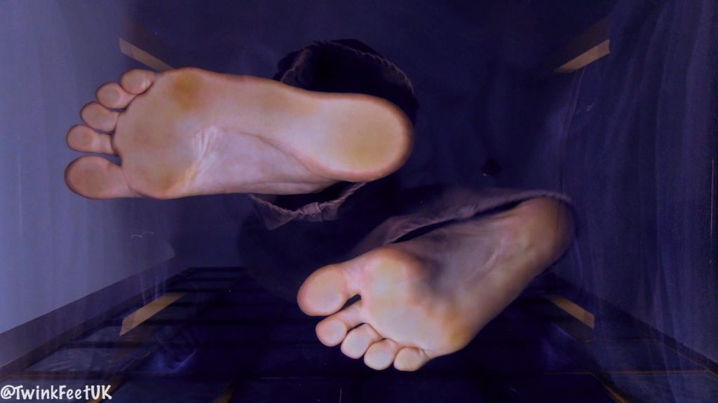 Screencaps of @danverdeer barefoot on a glass panel